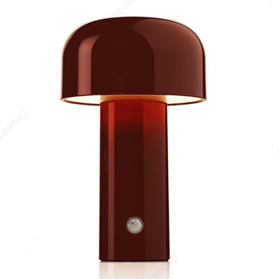 Small wireless mushroom-shaped bedside lamp.