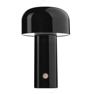 Small wireless mushroom-shaped bedside lamp.