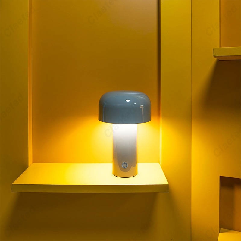 Small wireless mushroom-shaped bedside lamp.